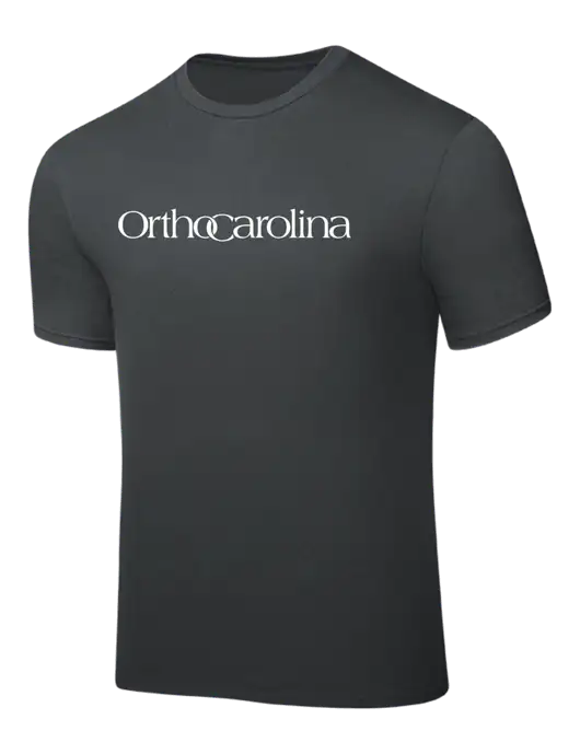 Dark Grey PosiCharge Competitor Tee w/OrthoCarolina Logo