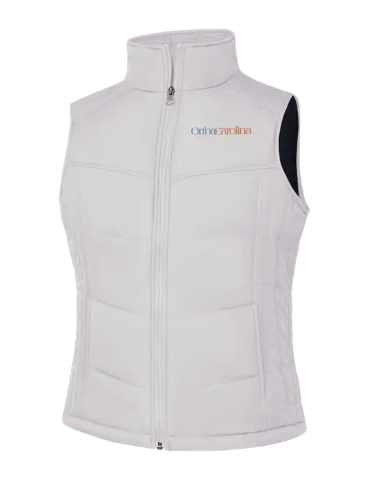 Womens White/Dark Slate Puffy Vest w/OrthoCarolina Logo