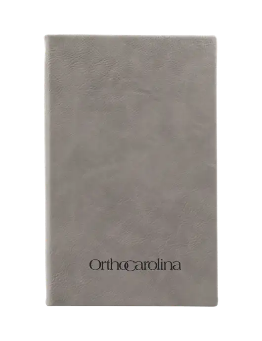 Grey Leatherette 5.25 x 8.25 Journal w/OrthoCarolina Logo