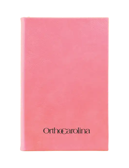 Pink Leatherette 5.25 x 8.25 Journal w/OrthoCarolina Logo