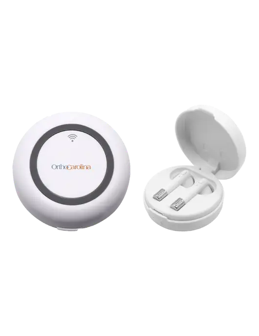 Harmony White Wireless Earbuds and Charging Pad w/OrthoCarolina Logo