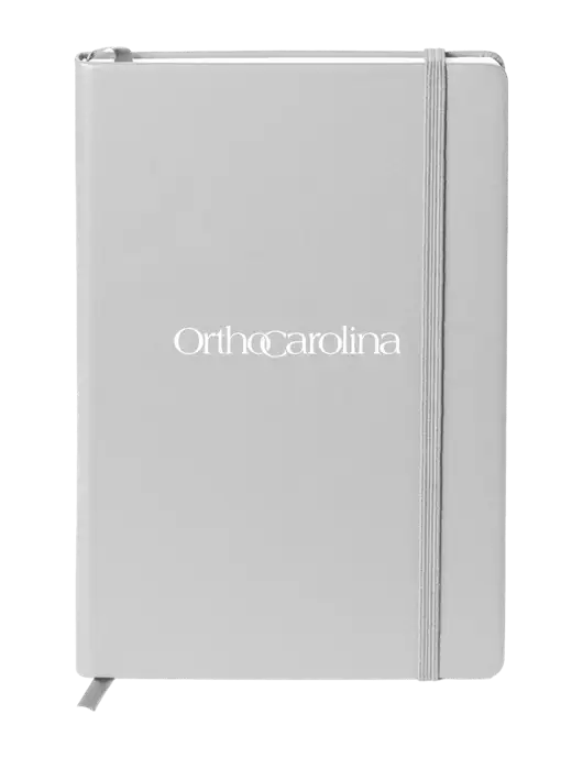 Neoskin Silver Hard Cover Journal 5.75 x 8.375
 w/OrthoCarolina Logo