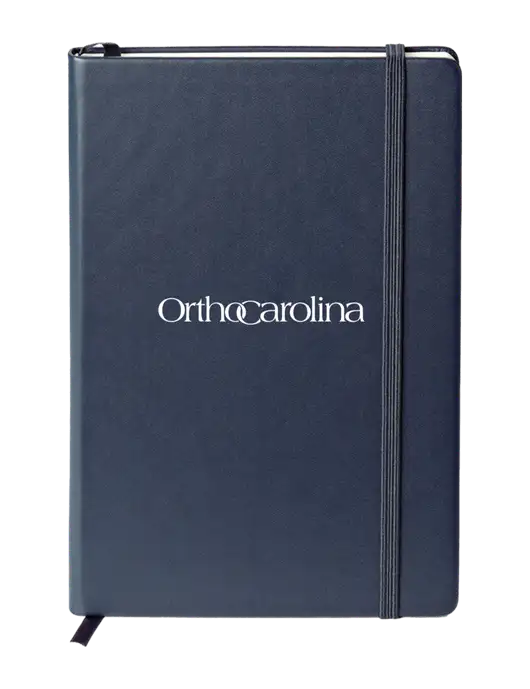 Neoskin Navy Hard Cover Journal 5.75 x 8.375 w/OrthoCarolina Logo